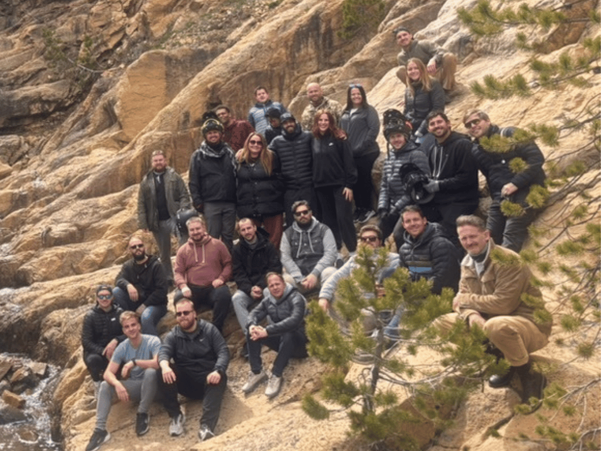 Full Lumion team group photo in natural outdoor setting