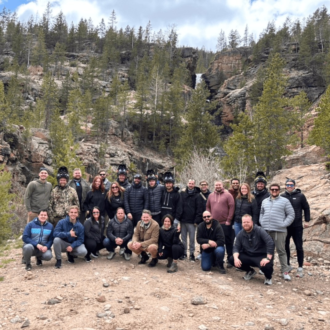Full Lumion team group photo in natural outdoor setting